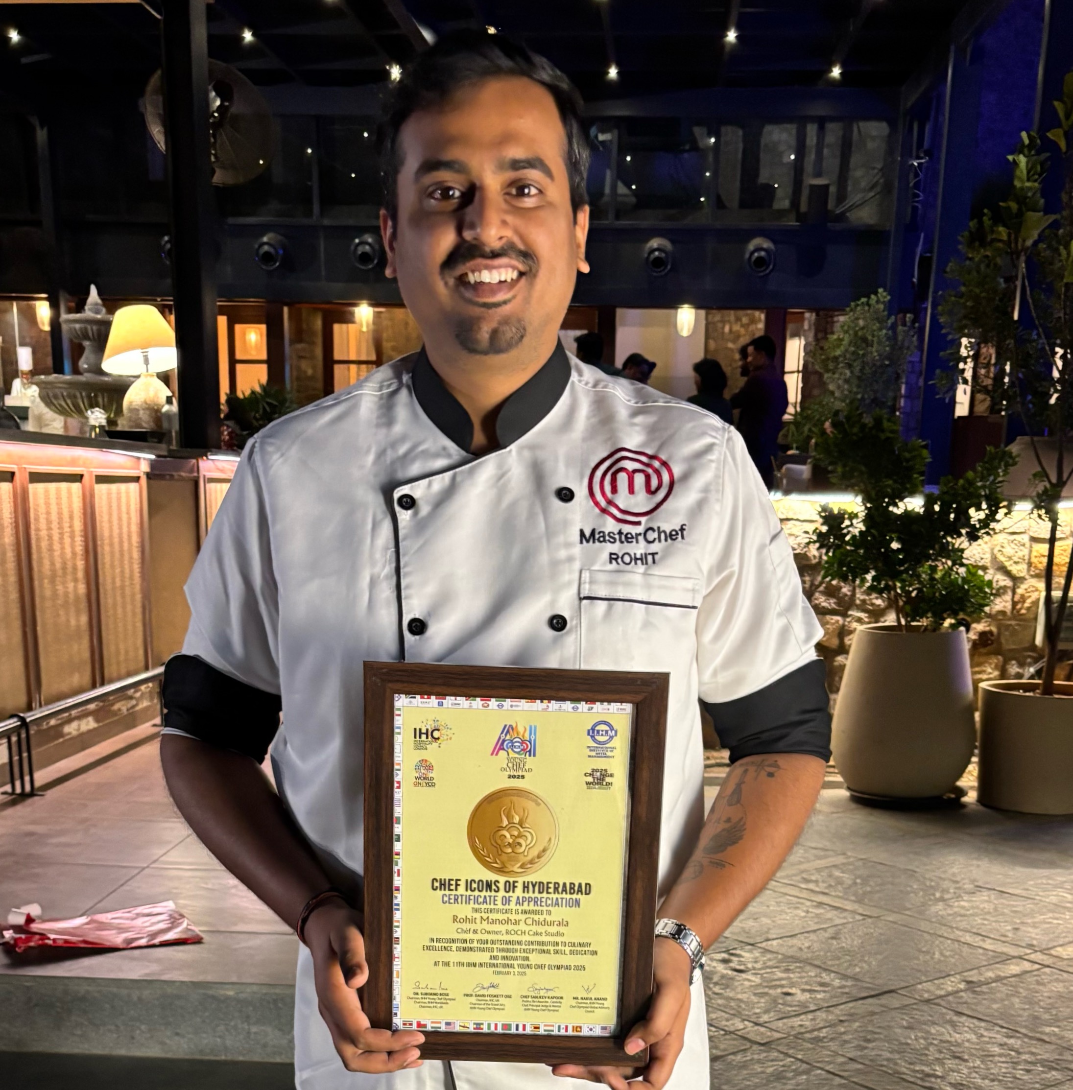 Chef Rohit receiving the Chef Icons of Hyderabad award
